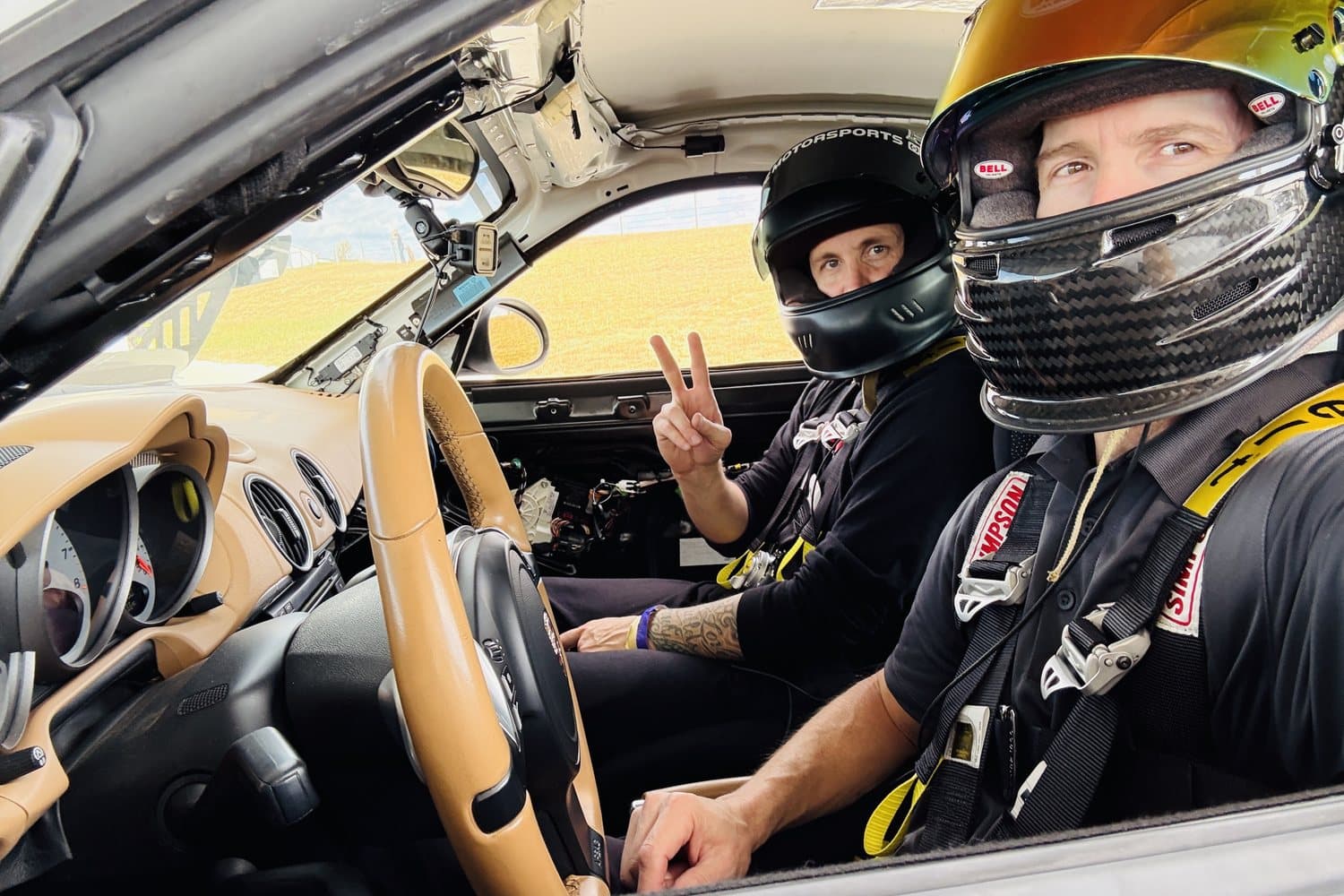 Jon-Eric Fountain coaching a driver from the passenger seat