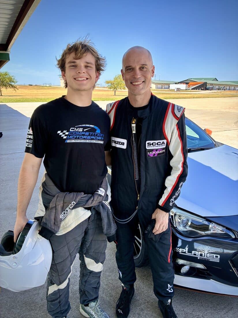 The Ten Lap Challenge field standing with the BRZ after the day's running.