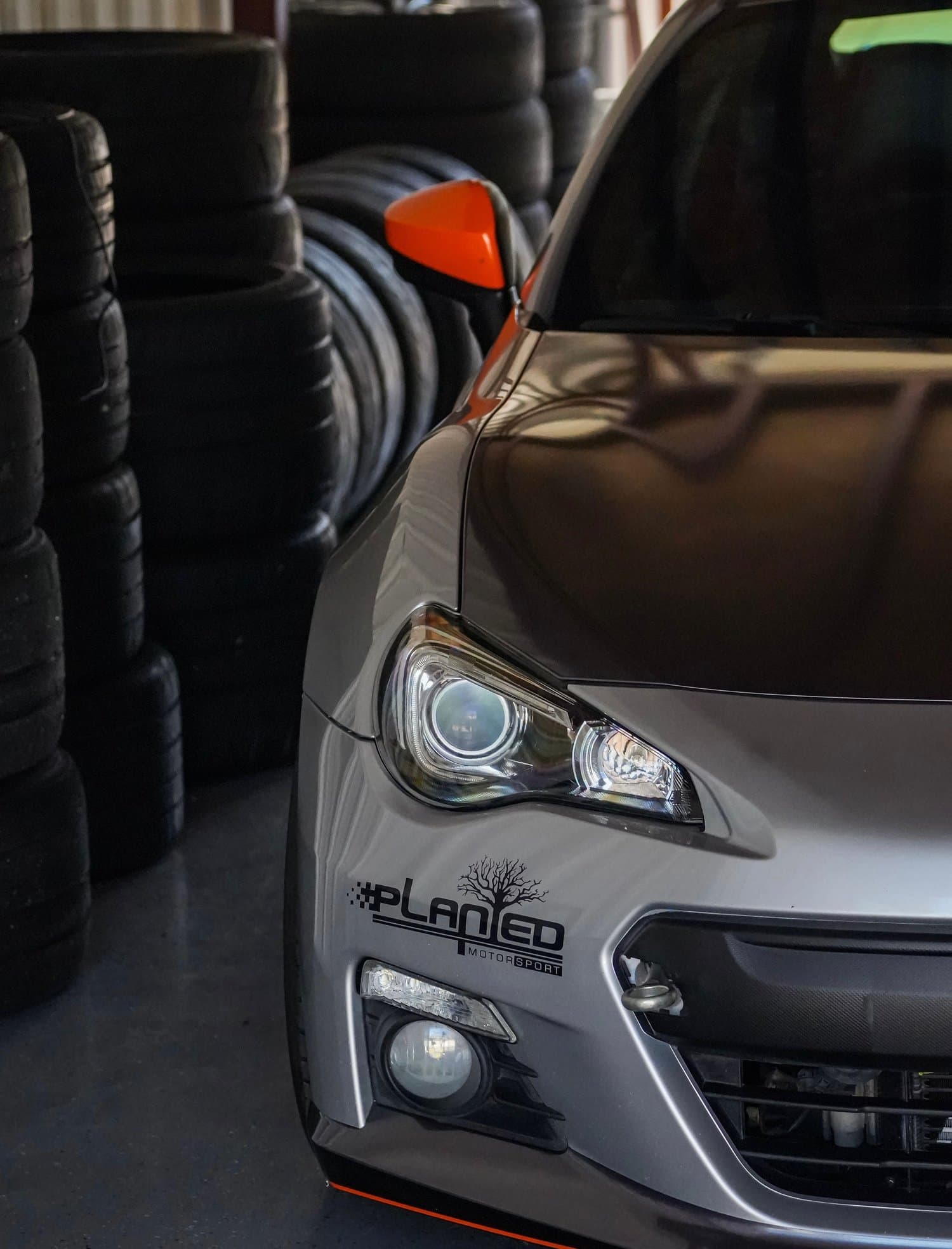 A race-prepped car in the garage at Motorsport Ranch Cresson